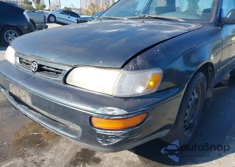 1997 Toyota Corolla Dx z USA, uszkodzony, nr VIN 1NXBB02E2VZ553840
